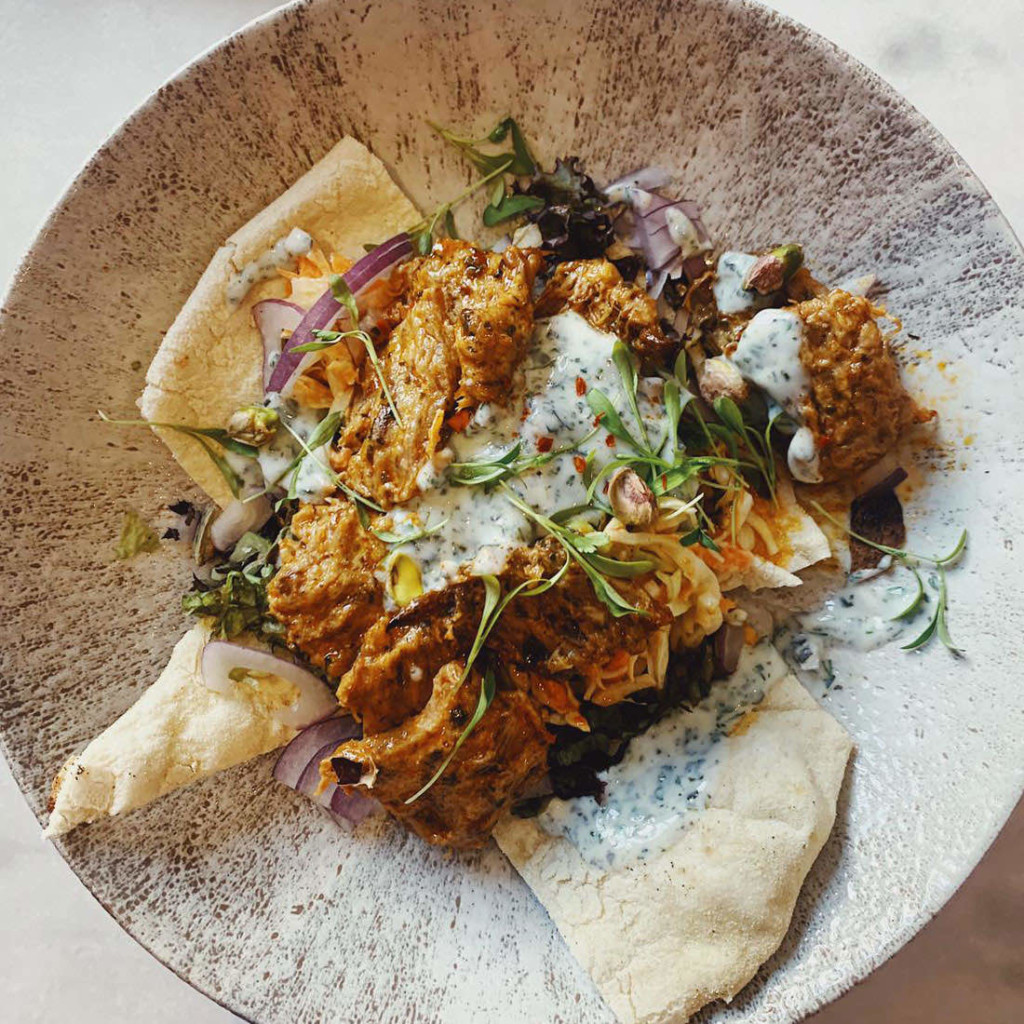 a plate of mock's plant-based lamb on top of a table