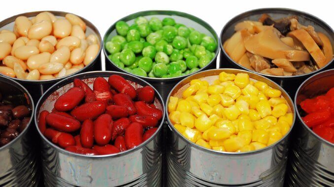 Close up of opened cans of vegetables Close up of opened cans of vegetables