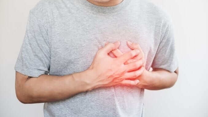 a man touching his heart, with red highlight of heart attack, and others heart disease concept, on white background a man touching his heart, with red highlight of heart attack, and others heart disease concept, on white background