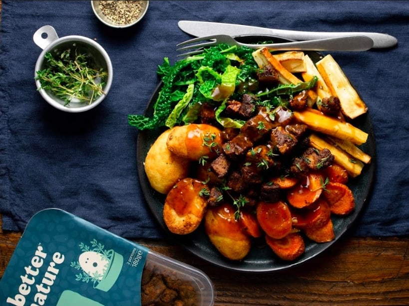 a plate of potatoes with a tempeh roast made by better nature 