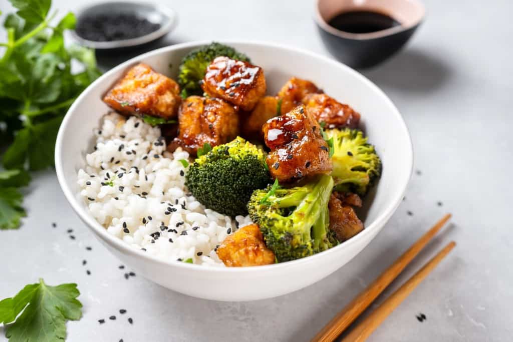 Asian,Vegan,Bowl,With,Rice,,Broccoli,And,Fried,Tofu ChickP