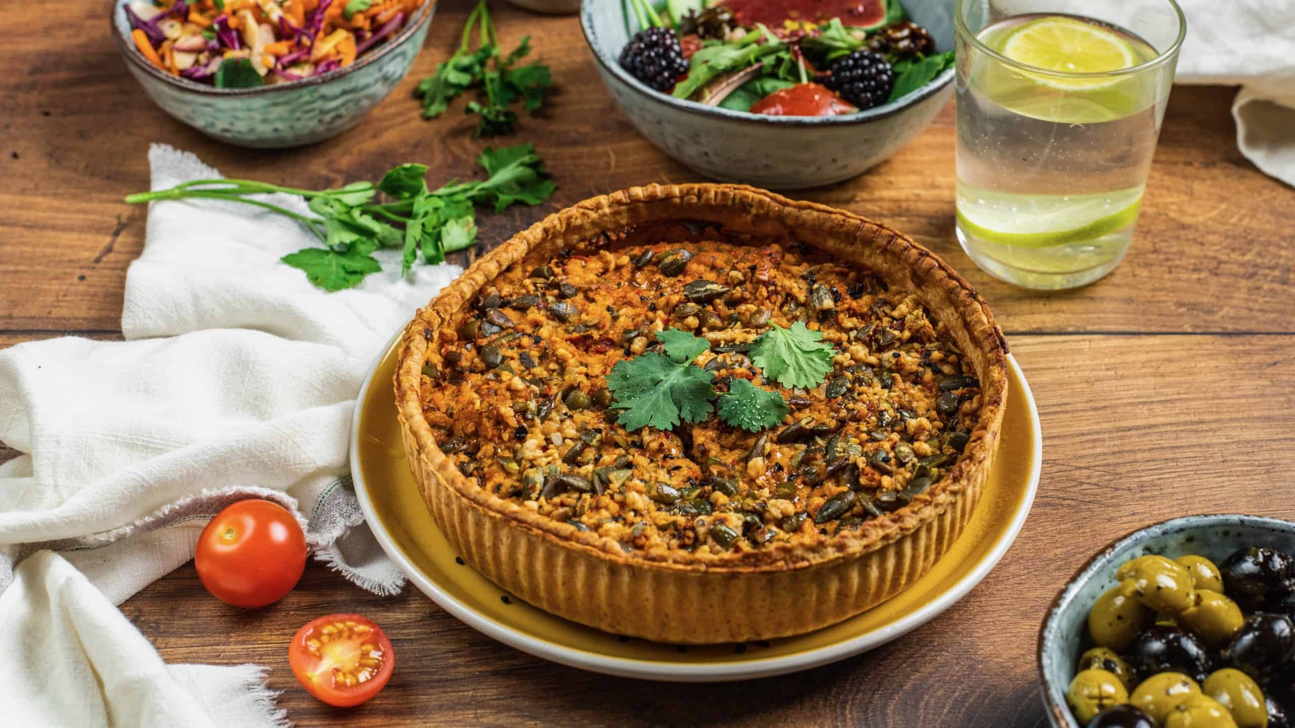 clive's purely plants quiche on top of a table