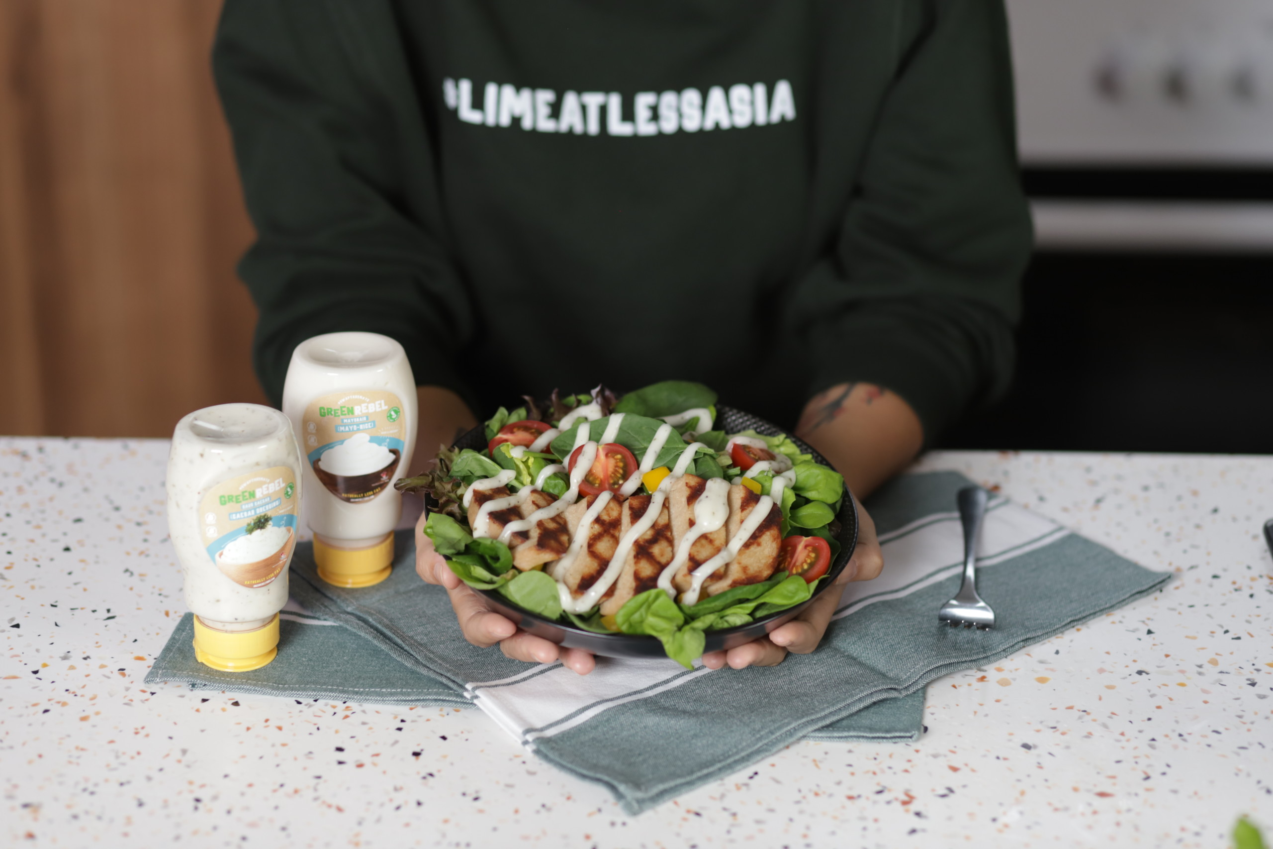 a plate of plant-based food with vegan mayonnaise