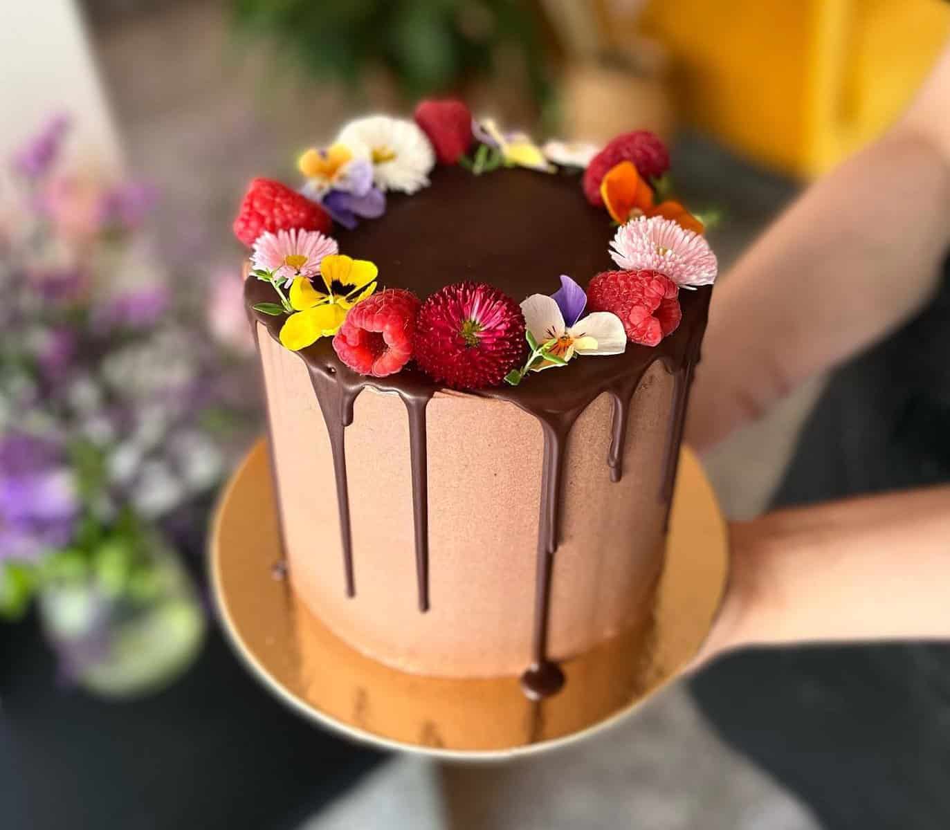 a vegan cake with flowers made by Eter coffeeshop in Warsaw Poland