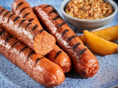 four heura chorizos on a plate