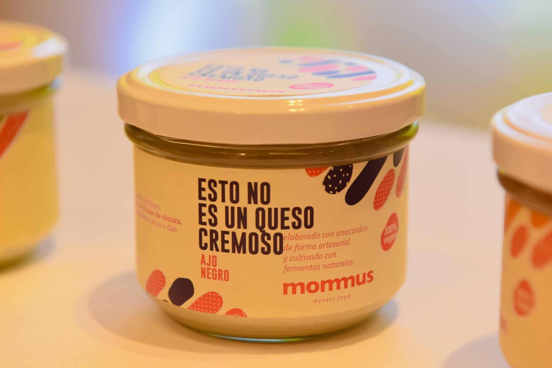 a jar of vegan cheese made by spanish vegan cheese producer mommus