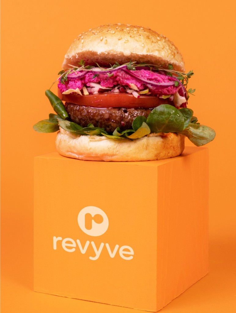 Revyve burger on orange box