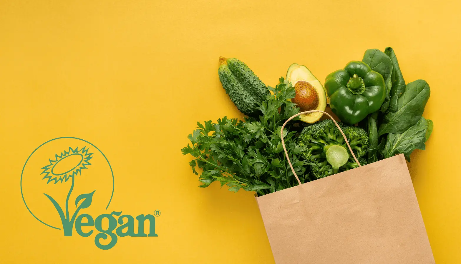 The Vegan Society logo with grocery bag of veg
