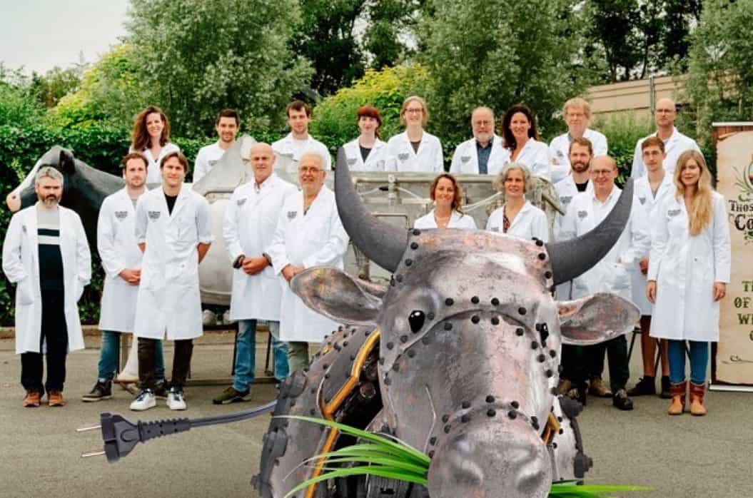 those vegan cowboys' team in a group picture with their pet, a metal cow called margaret