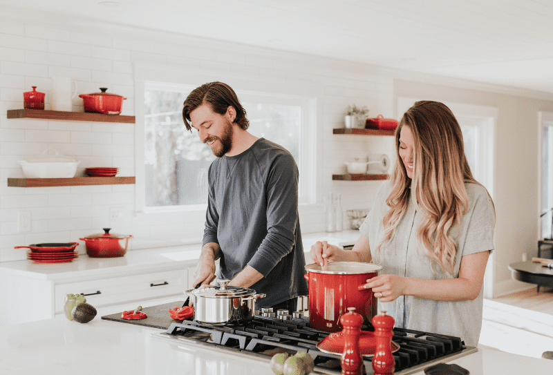 Young couple cooking in kitchen ProVeg