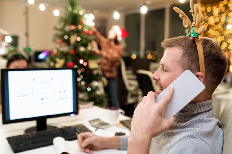 Business man in office at Christmas