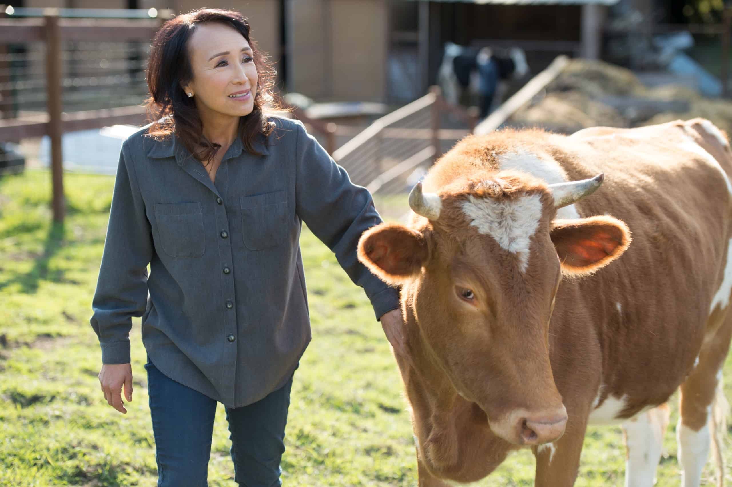 Miyoko Schinner with Cow