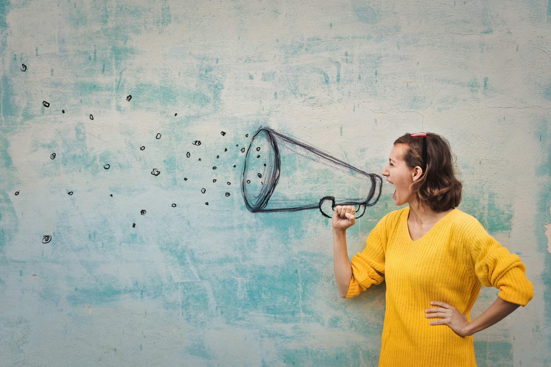 Woman shouting in megaphone